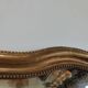 Louis Philippe gilded mirror with gendarme hat nineteenth H:130cm