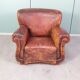 Leather nailed armchair