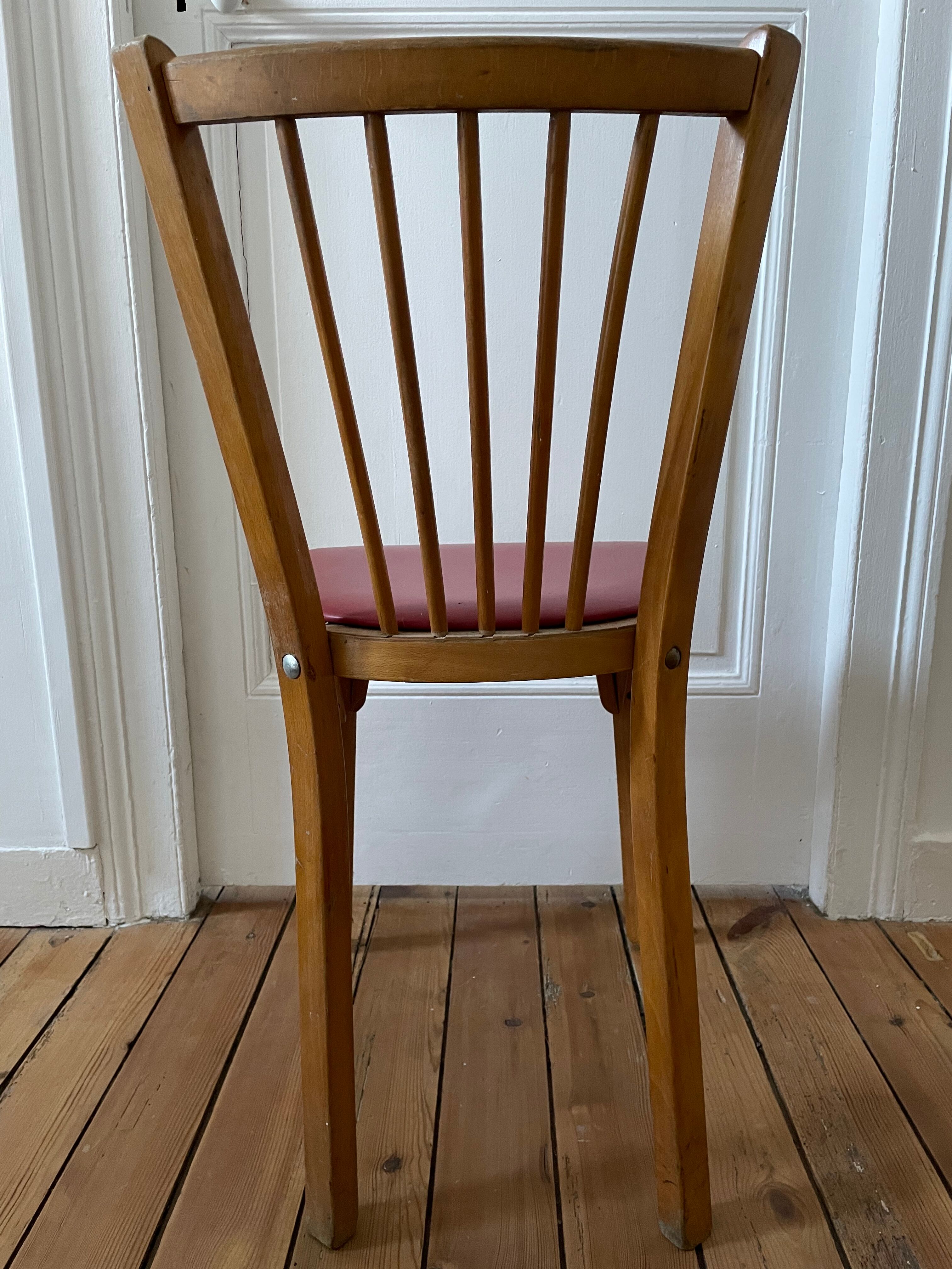 6 chaises de bistrot Baumann en bois et skaï