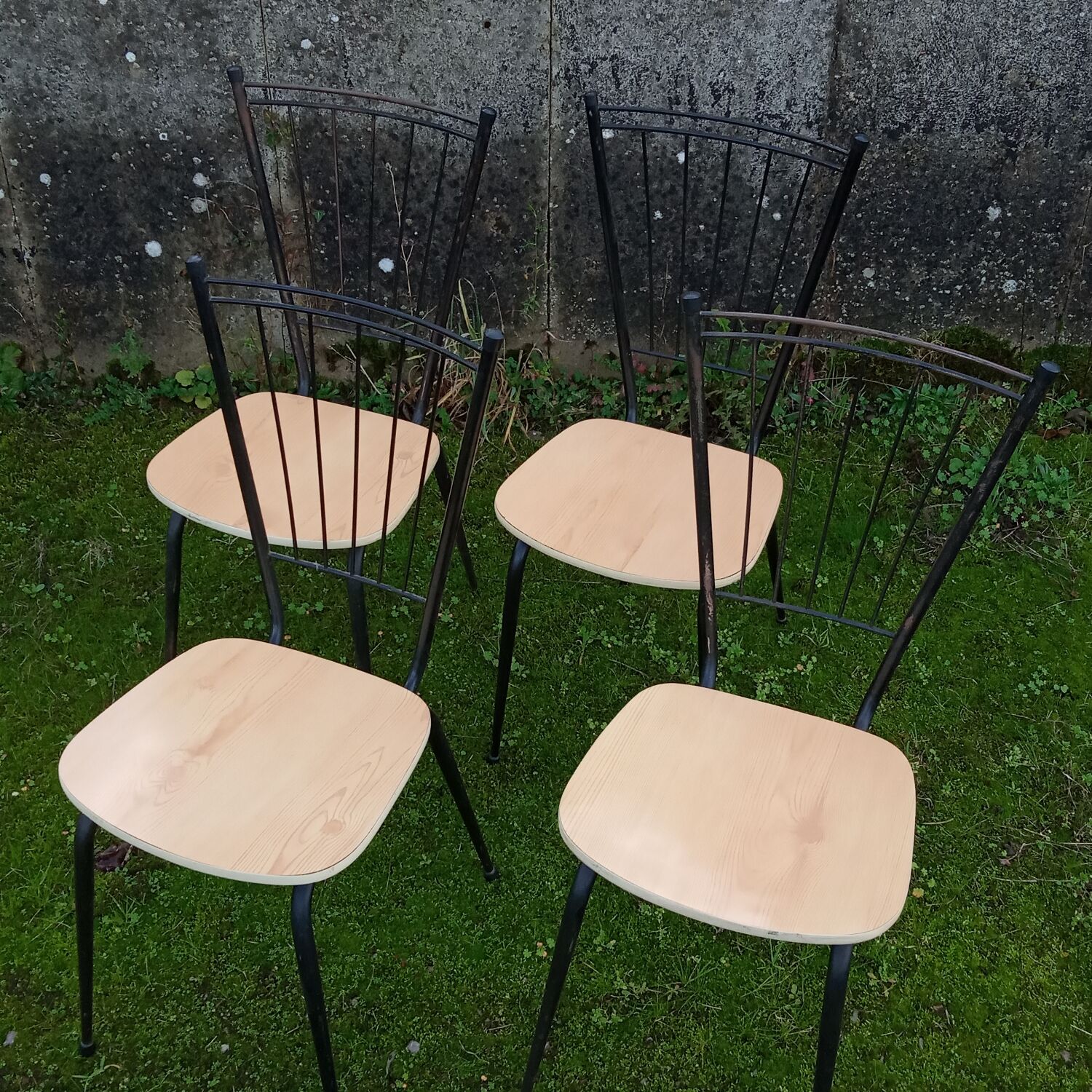 Four faux-wood Formica chairs, 50s/60s
