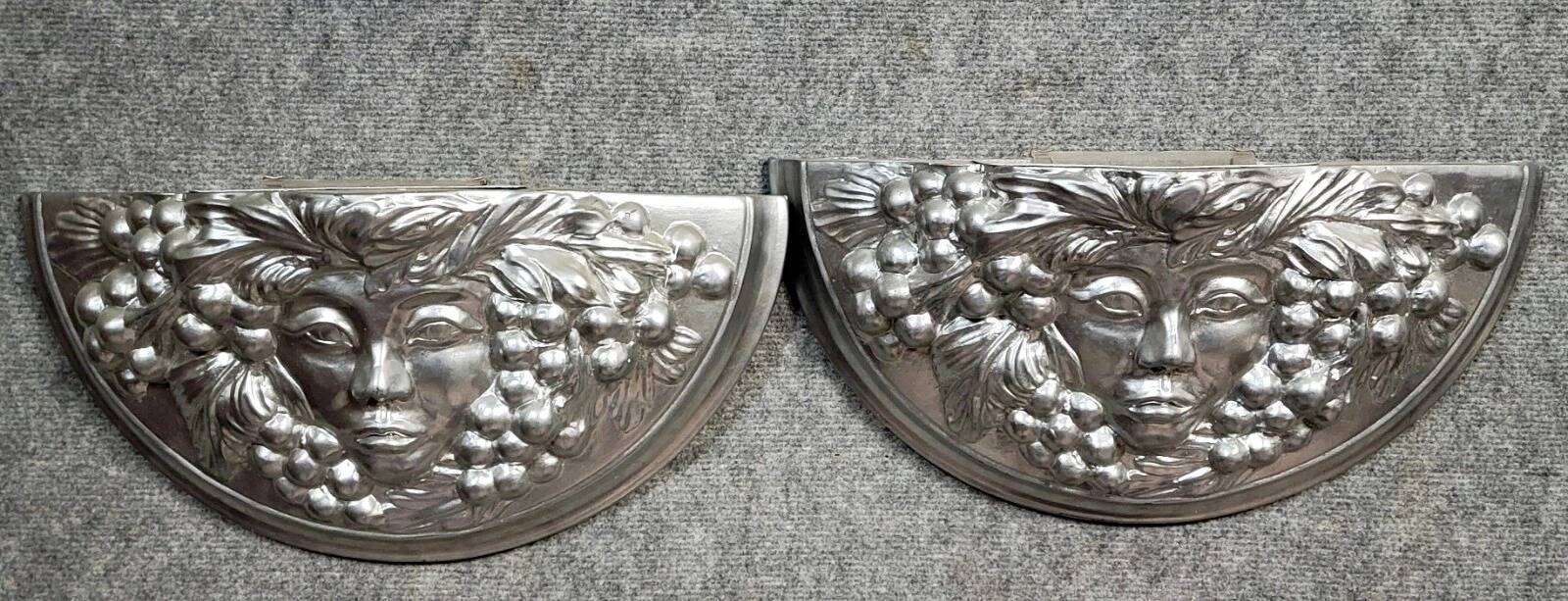 Pair of Art Deco style wall sconces in silvered plaster