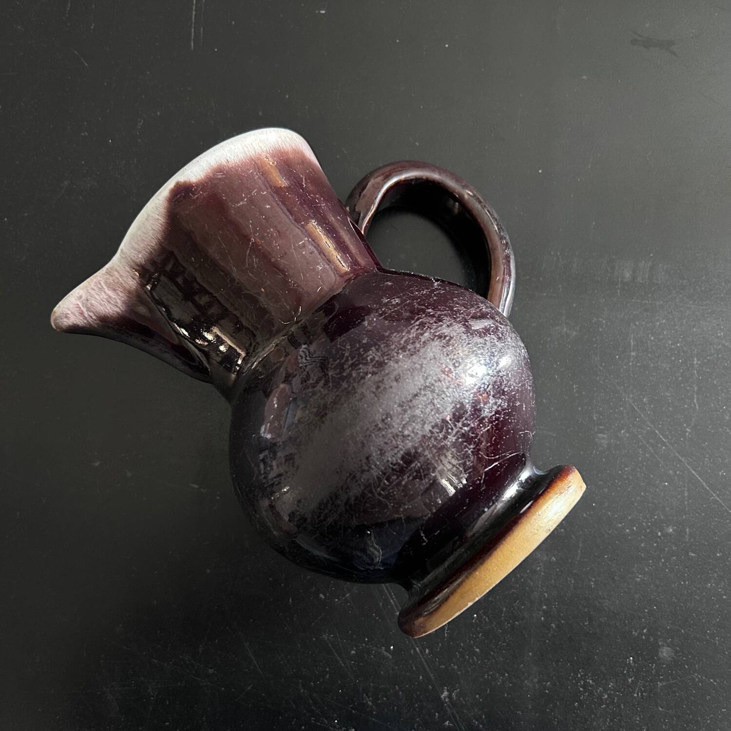 Antique tilted pitcher