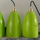 Set of four new electrified green opaline suspensions