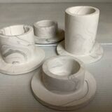 Four gypsum composite candle holders
