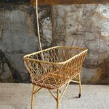Rattan cradle with arrow