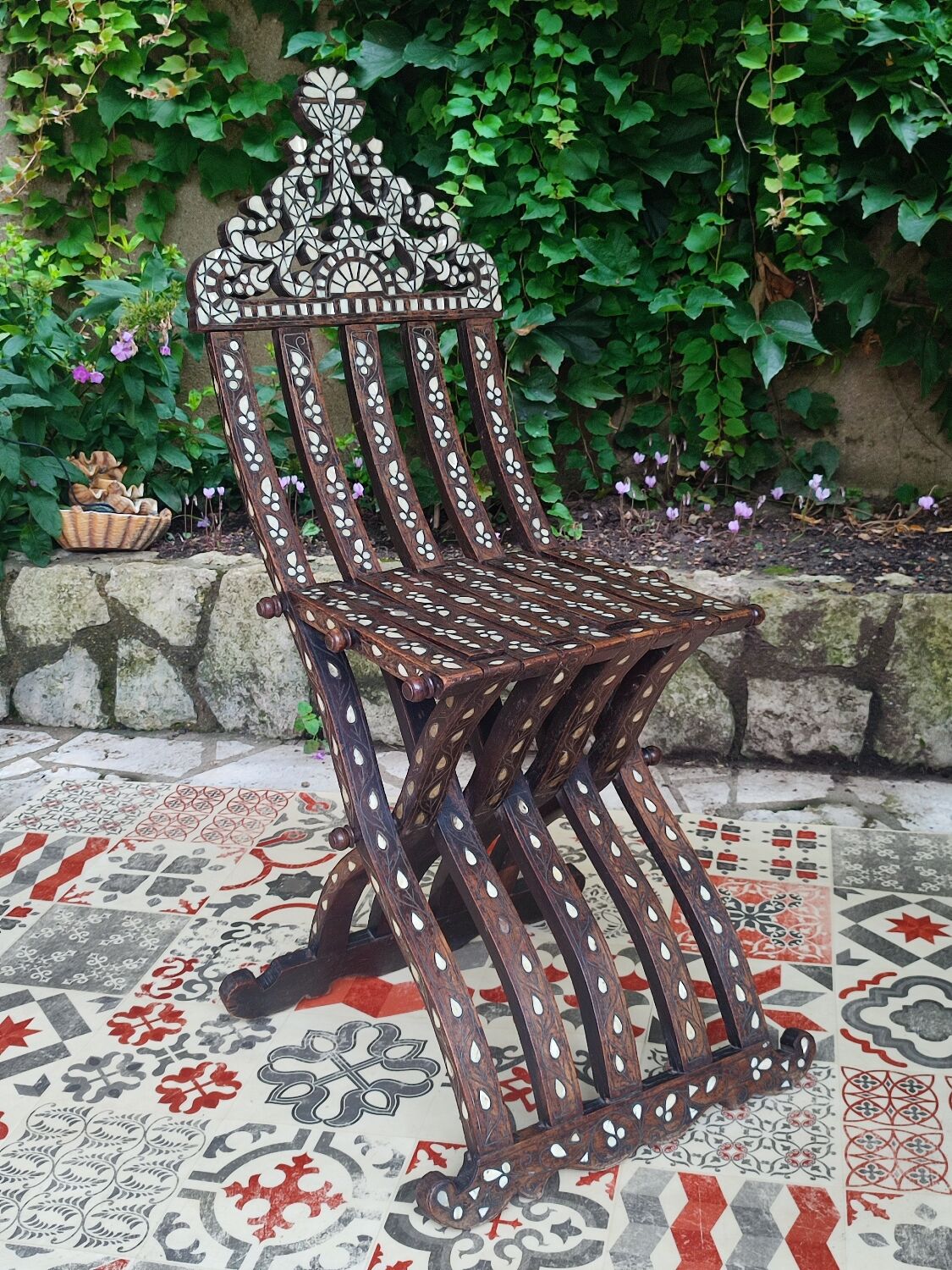 Antique folding oriental chair with mother-of-pearl inlays