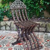 Antique folding oriental chair with mother-of-pearl inlays