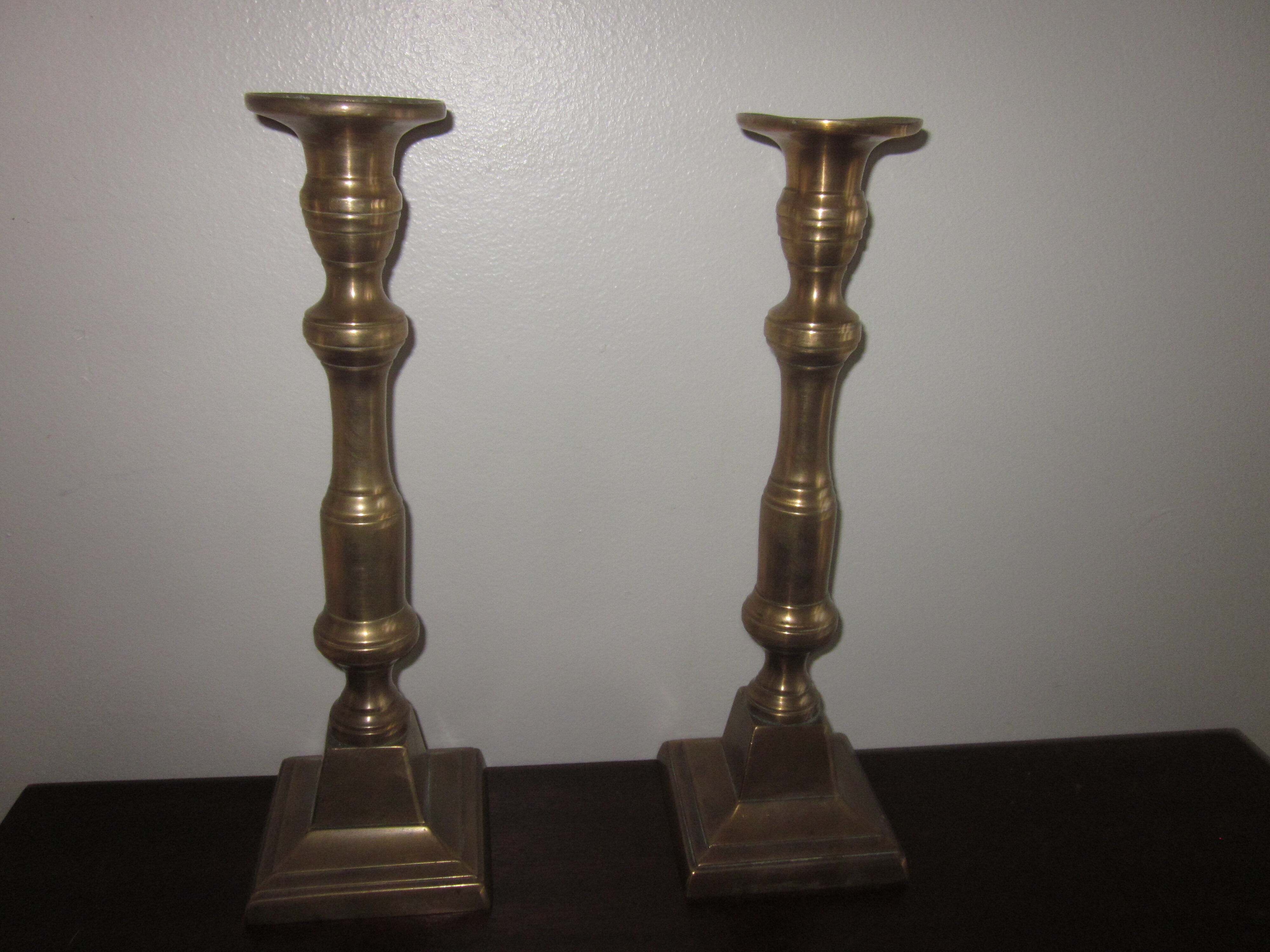 pair of old bronze candlesticks
