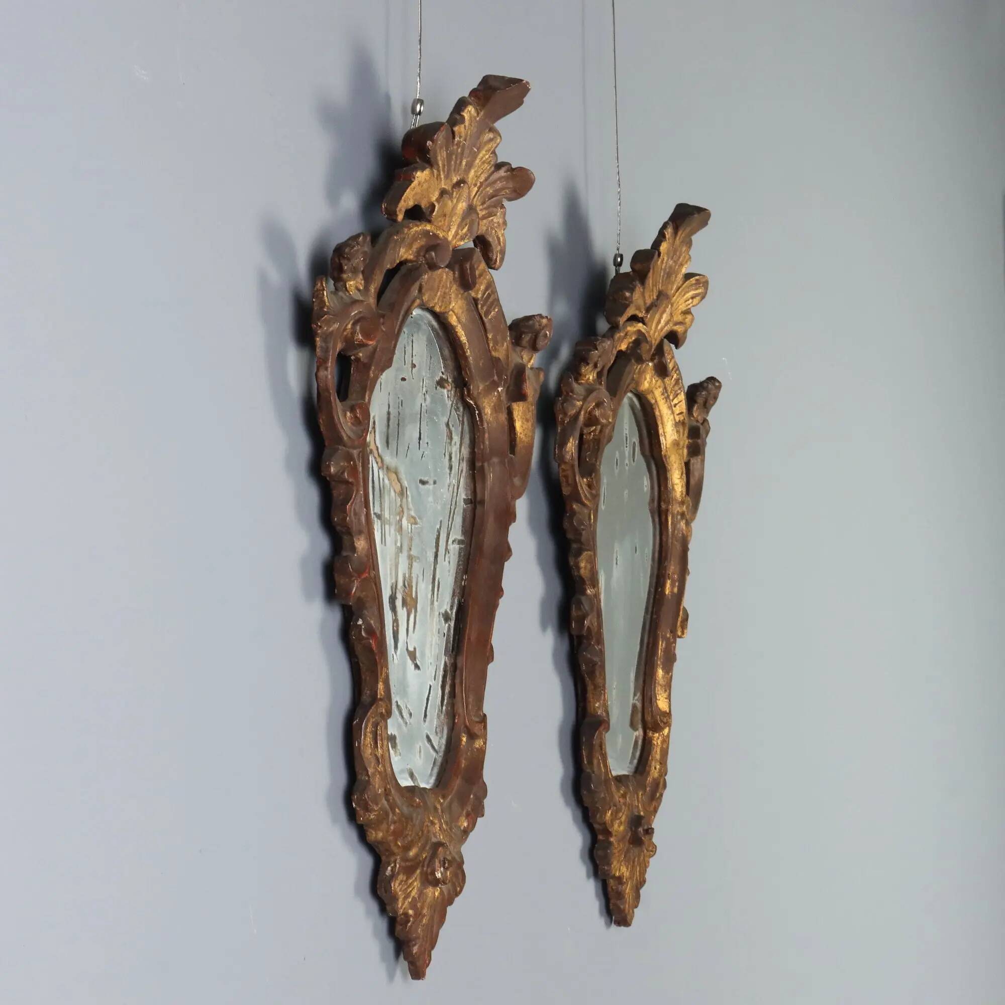 Small antique mirrors in carved and gilded wood, Italy, 20th century.