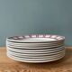 Series of 10 vintage Badonviller earthenware flat plates