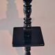 Column in blackened oak with two shelves.