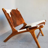 Chair in cowhide with ottoman inspiration Norwegian