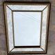 Antique rectangular mirror in gilded wood with glazing beads