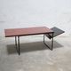 Modernist coffee table in wood and metal