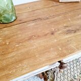Skated white footing farm table