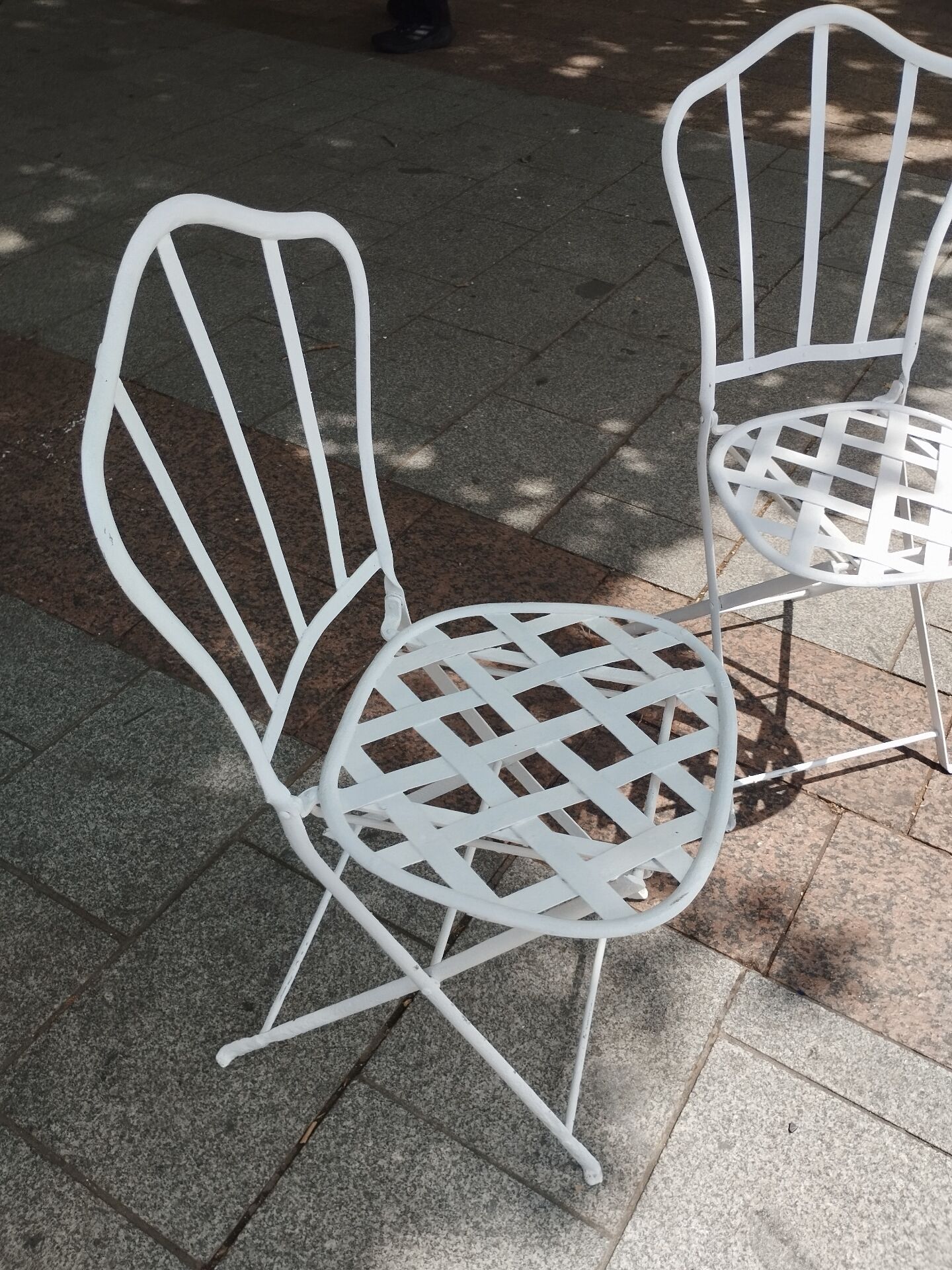 Antique garden furniture in solid wrought iron.