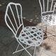 Antique garden furniture in solid wrought iron.