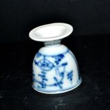 Antique porcelain diabolo egg cup with blue hand-painted onion decoration