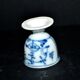 Antique porcelain diabolo egg cup with blue hand-painted onion decoration