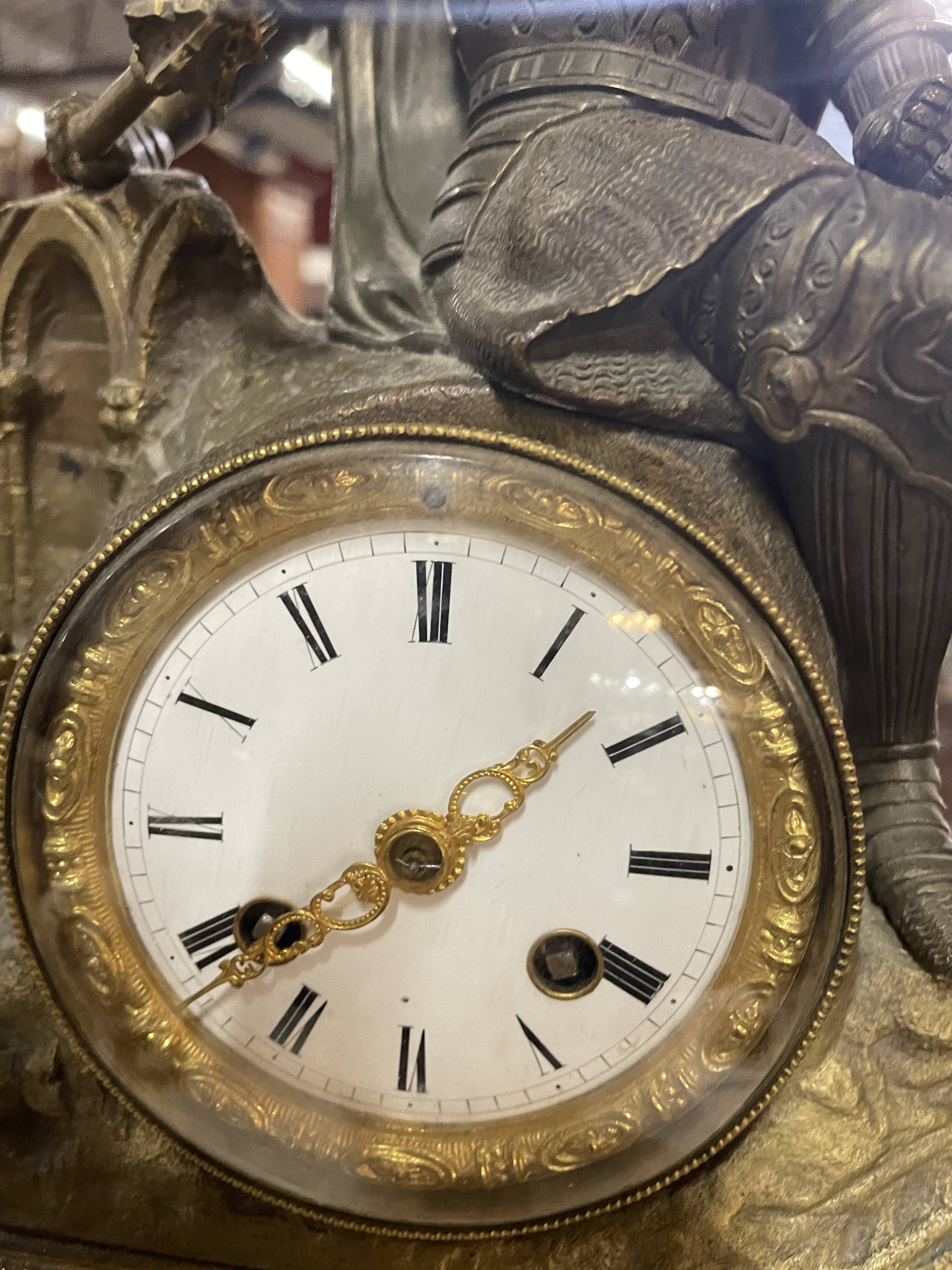 Pendulum in gilded bronze and onyx