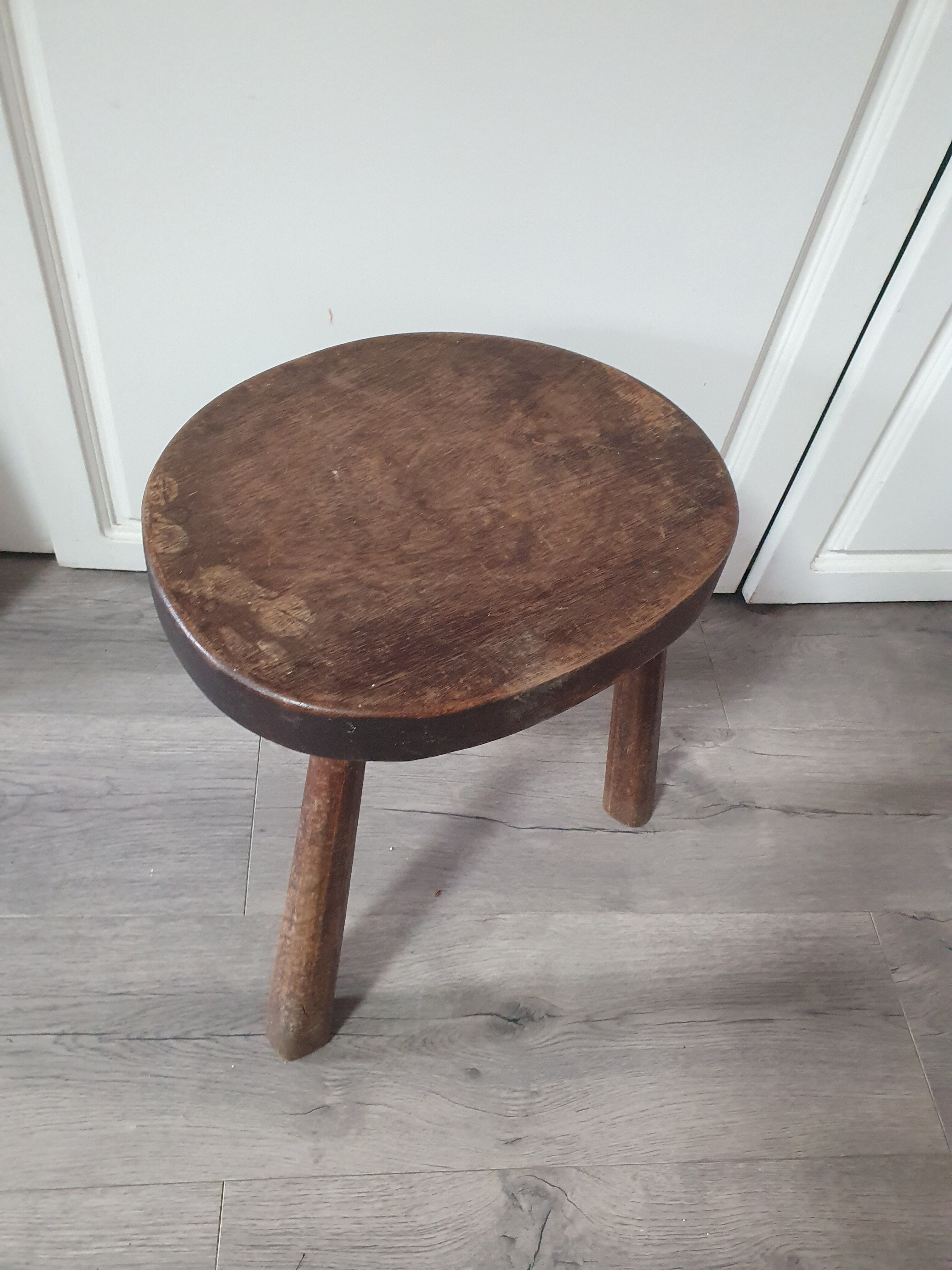 Vintage old wooden stool tripod