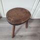 Vintage old wooden stool tripod