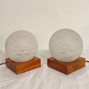Pair of wooden and glass table lamps. Italy, 1970s.