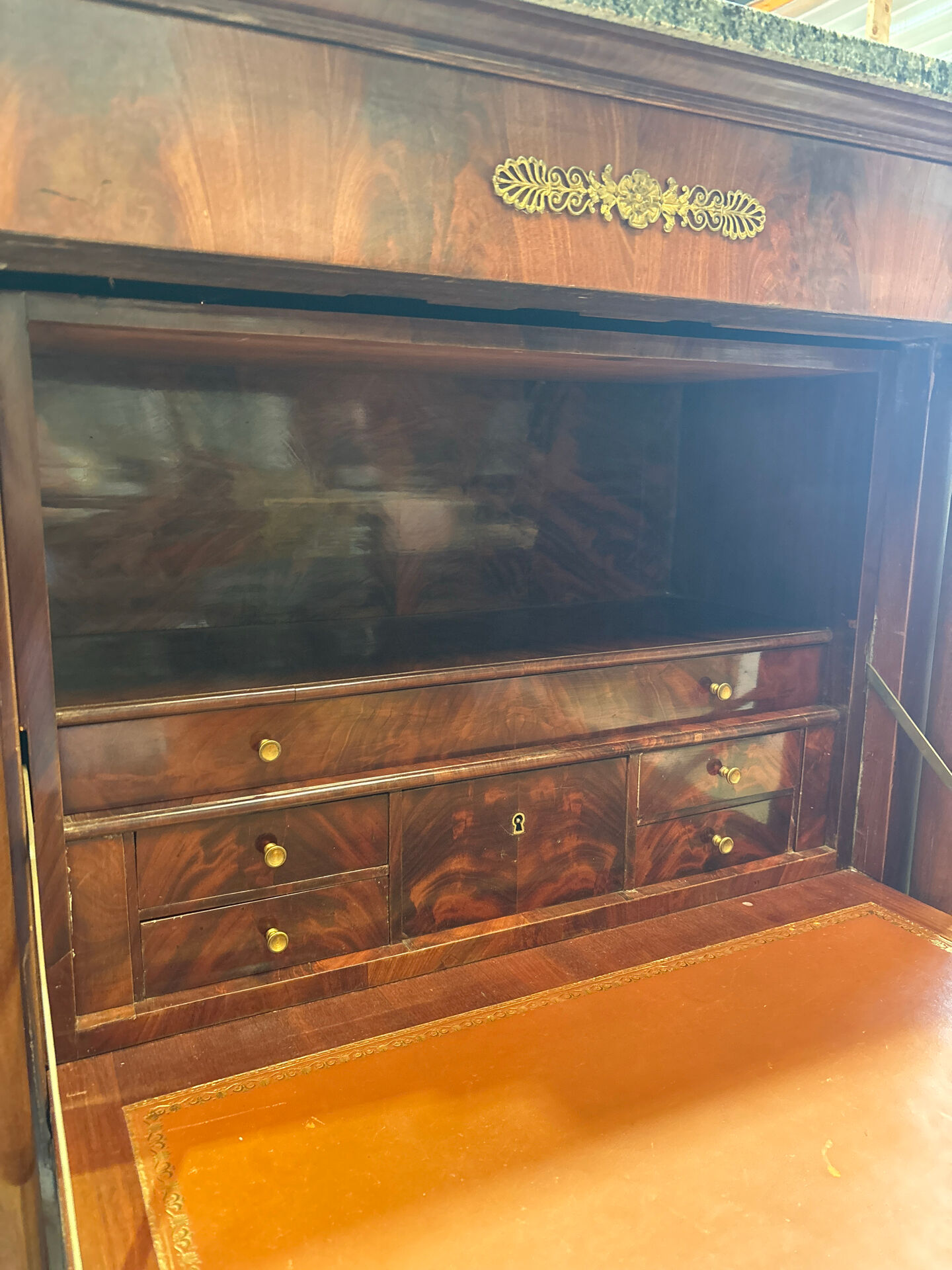 Empire secretary in mahogany, bronze and marble with secret drawers.