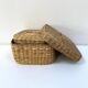 Vintage trio of small rattan nesting baskets