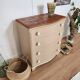 Chest of drawers with rounded front
