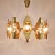 Oscar Torlasco brass chandelier of 25 inches with optical prism lenses, Italy, 1970s.