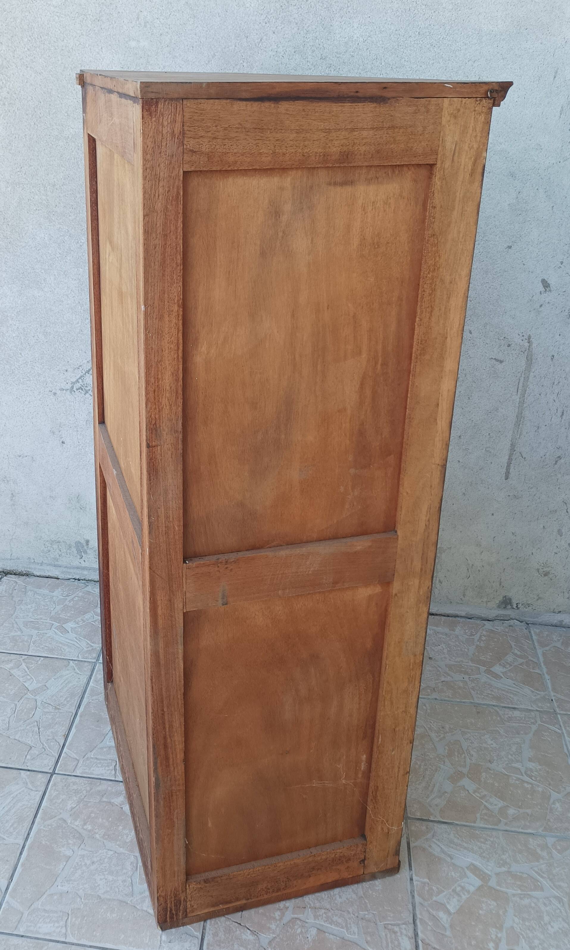 Corner cabinet in carved walnut, Savoyard style.