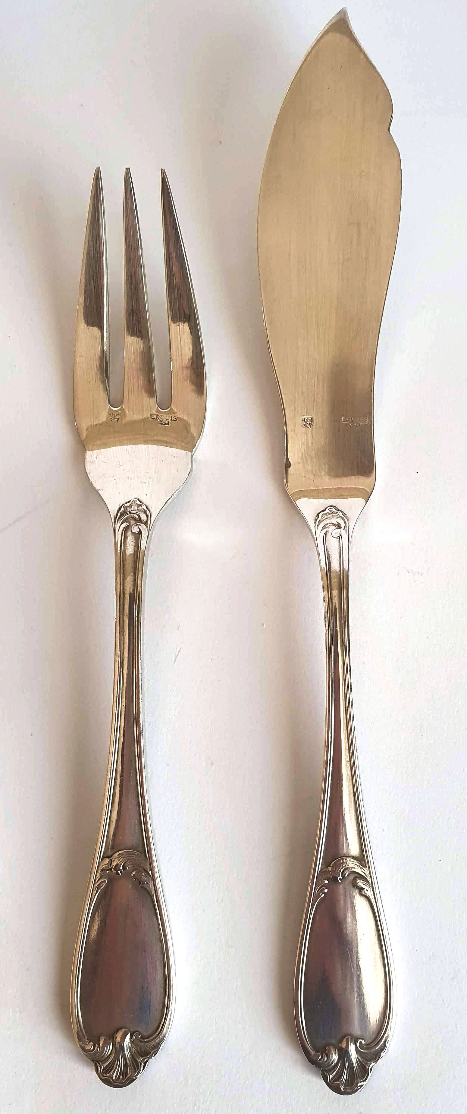 Fish set in silver metal Ercuis