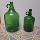 Set of 2 vintage green glass Demijohns.