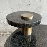 Memphis coffee table in black/gray granite and brushed stainless steel — sculptural double-tiered table in a postmodern 1980s style