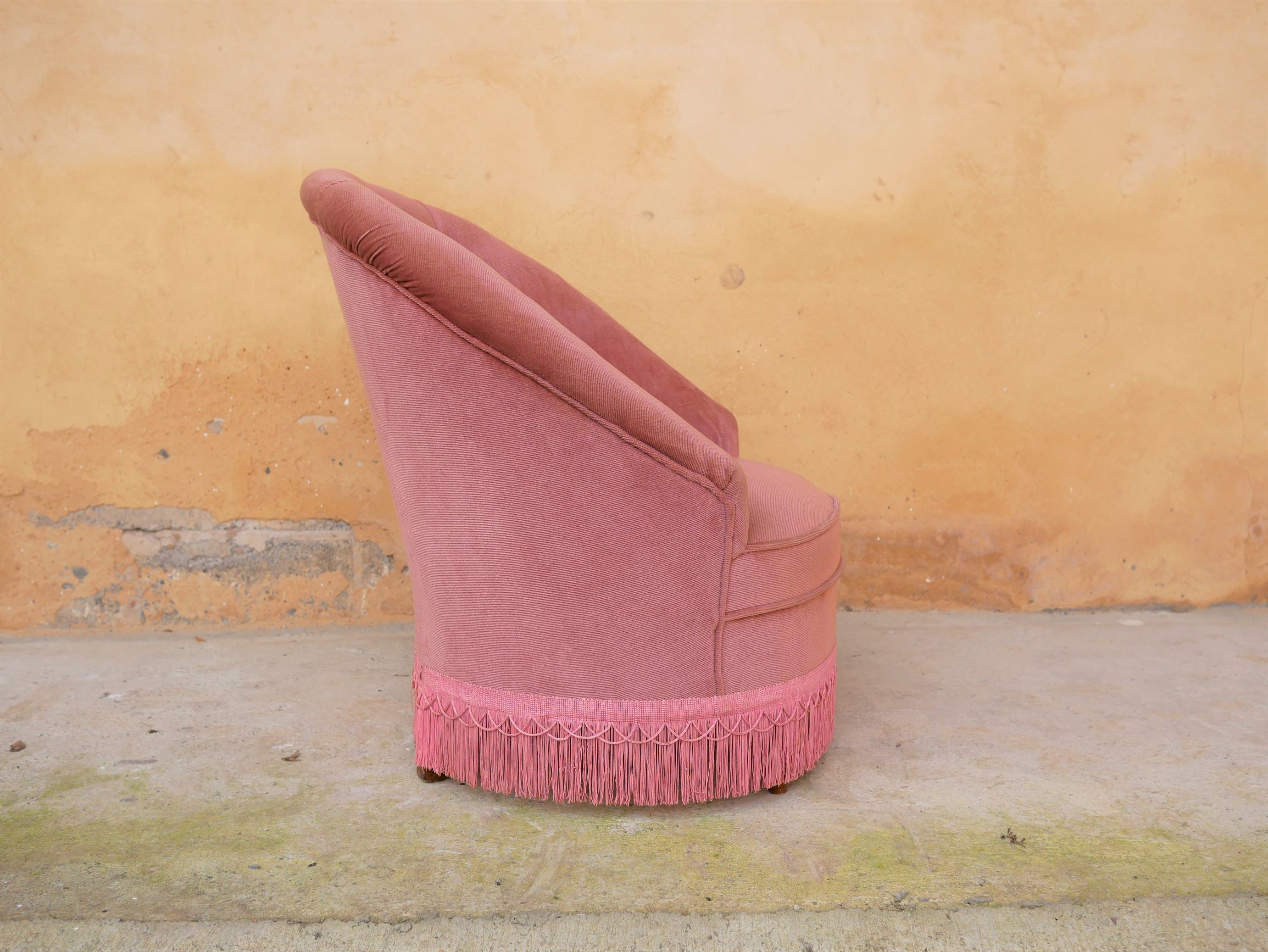 Old pink vintage padded "toad" chair