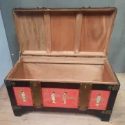 Red lacquered wooden mallet from the Far East.
