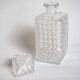 Whiskey decanter with spike pattern