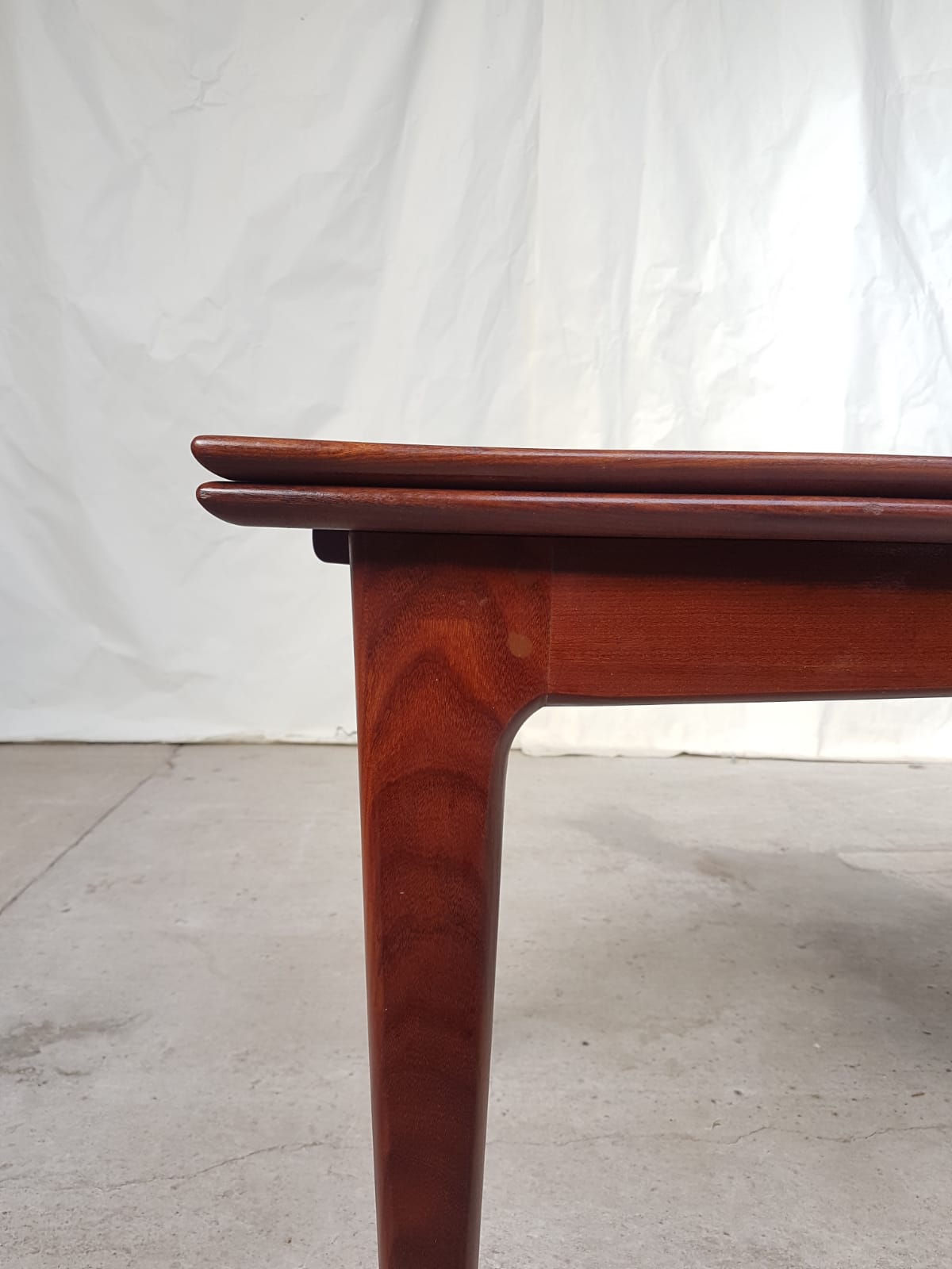 Teak extending dining table by Younger