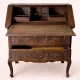 Antique solid wood secretary richly carved, in the Louis XV style.