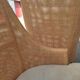 Canine rattan armchair