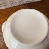 Small light beige earthenware teapot