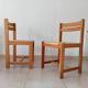 Lot de 2 chaises vintage en Orme massif et jonc dans le goût Regain/Asserbo