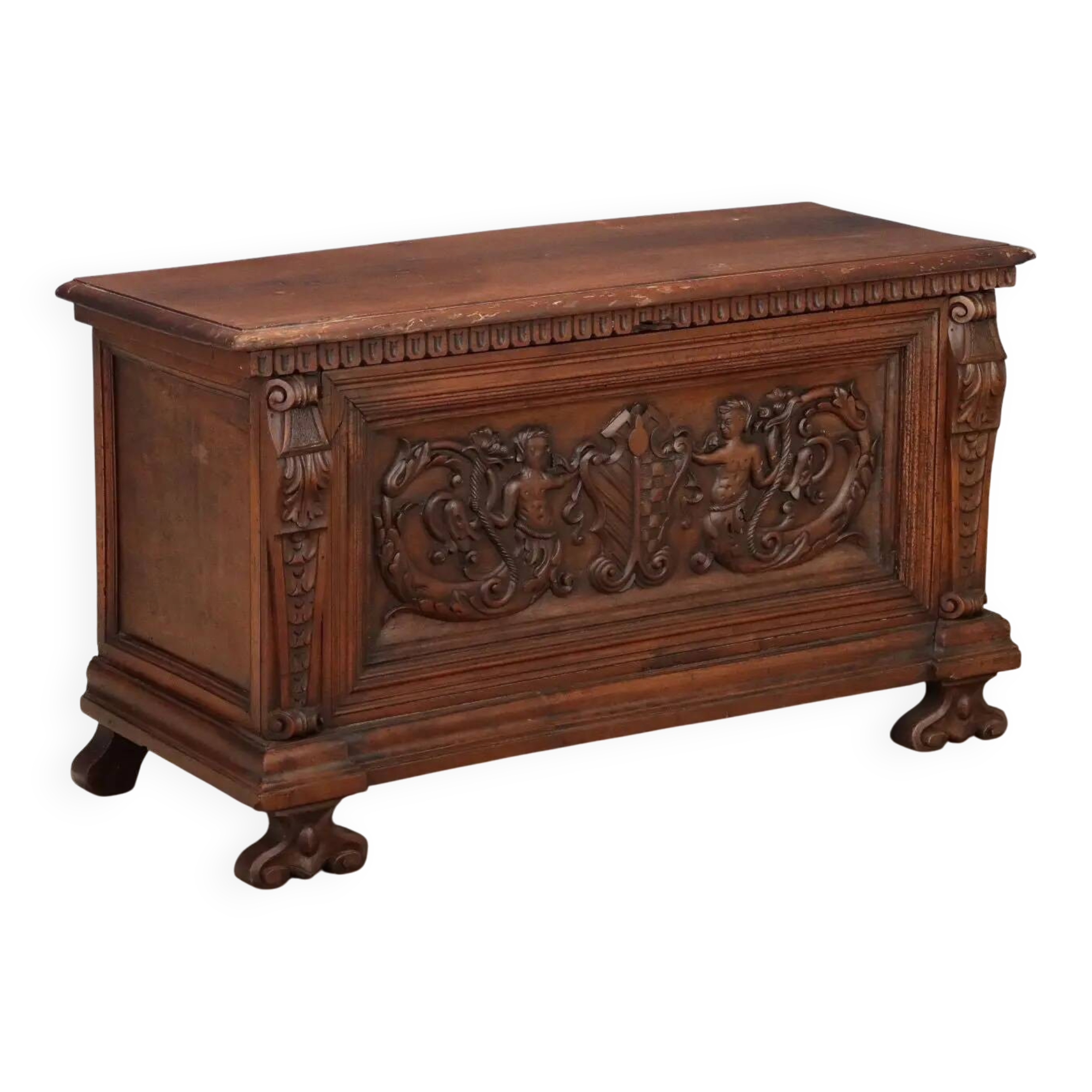 Walnut chest with baroque carvings