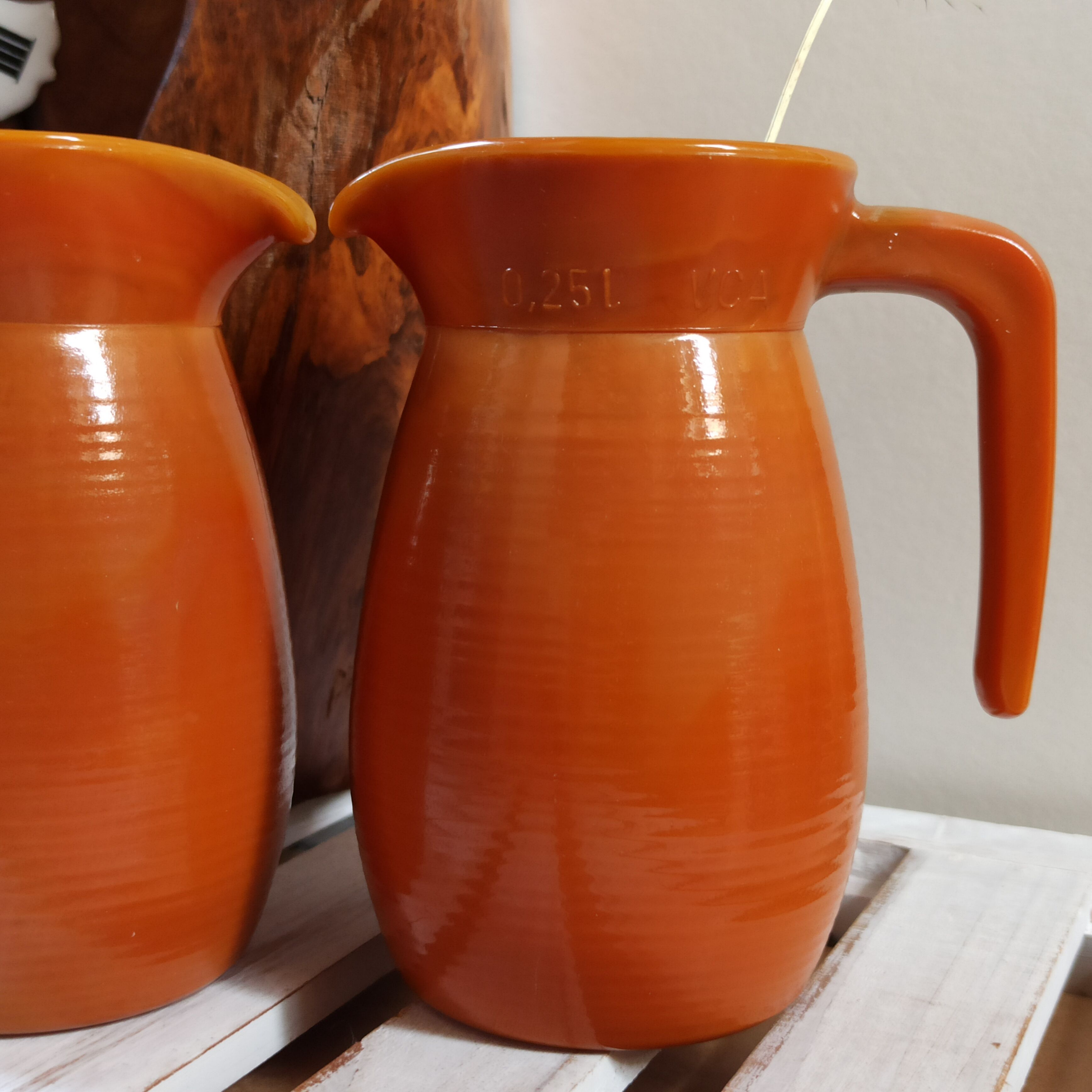 Two vintage arcopal volcano pitchers