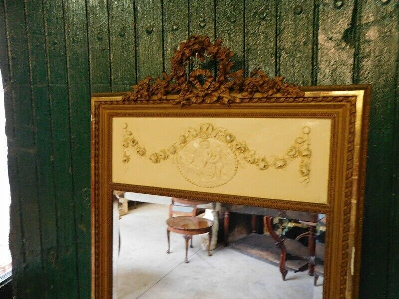 Louis XVI overmantel mirror with cherubs from the XIXth century