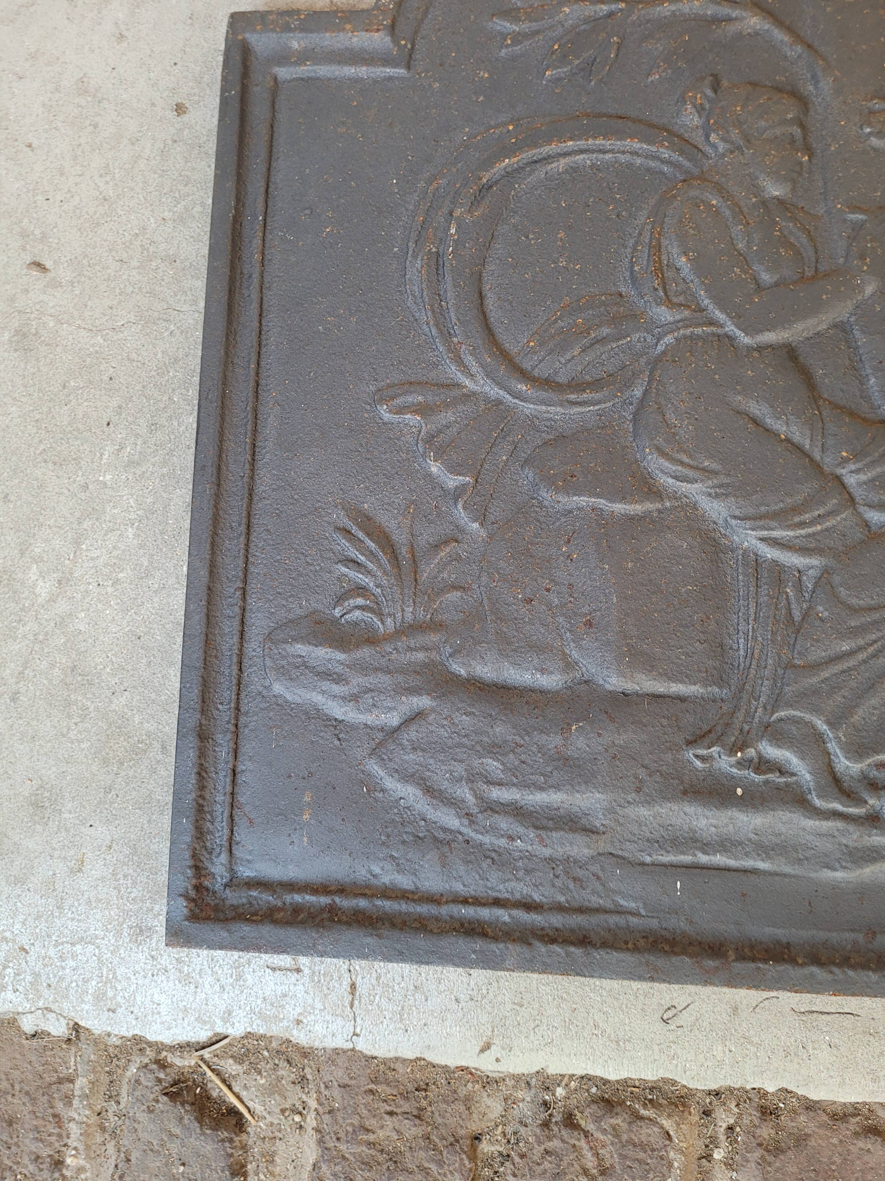 Plaque de cheminée en fonte