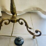 Floor lamp in gilded brass and round glass globe