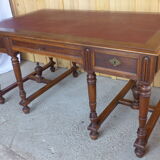 Flat walnut desk with eight feet turned