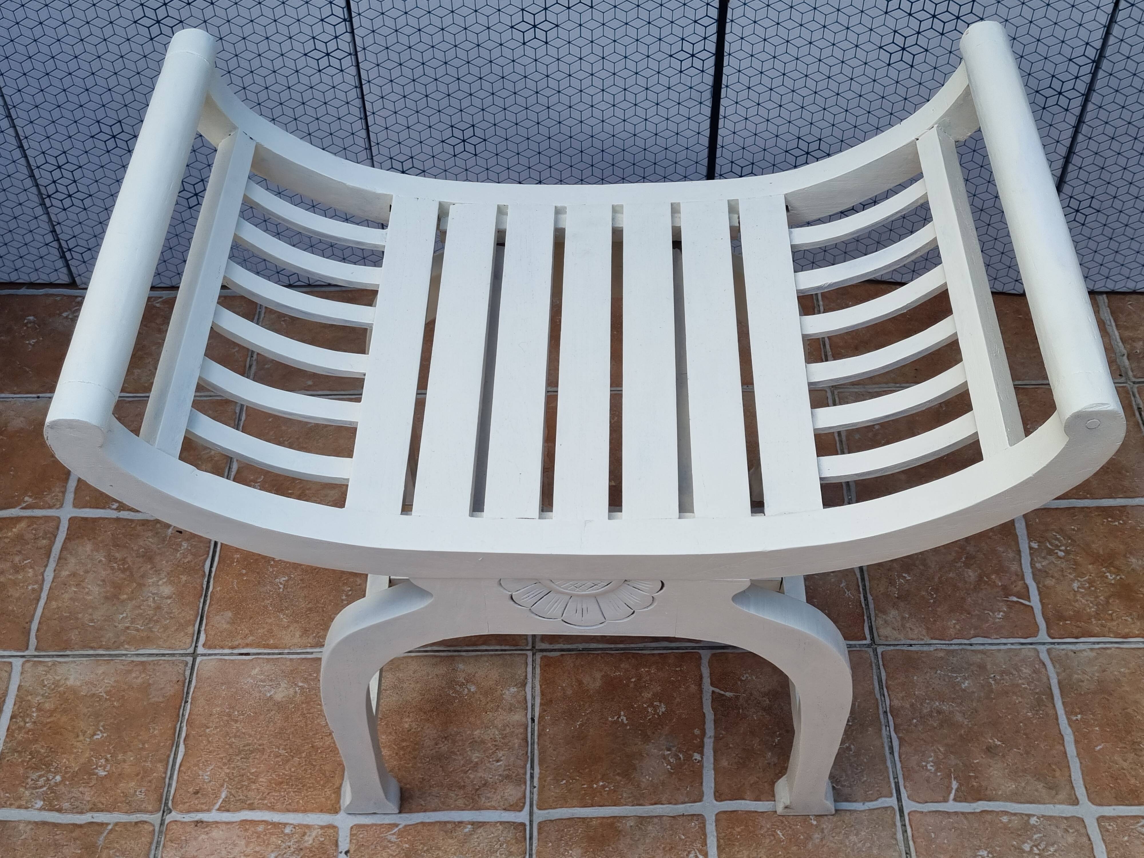 Curule stool in patinated carved wood, Manuel Canovas seat, 60 cm